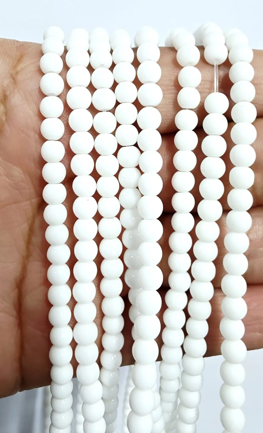 Tira de piedras de Onix Blanco Brillante N°4
