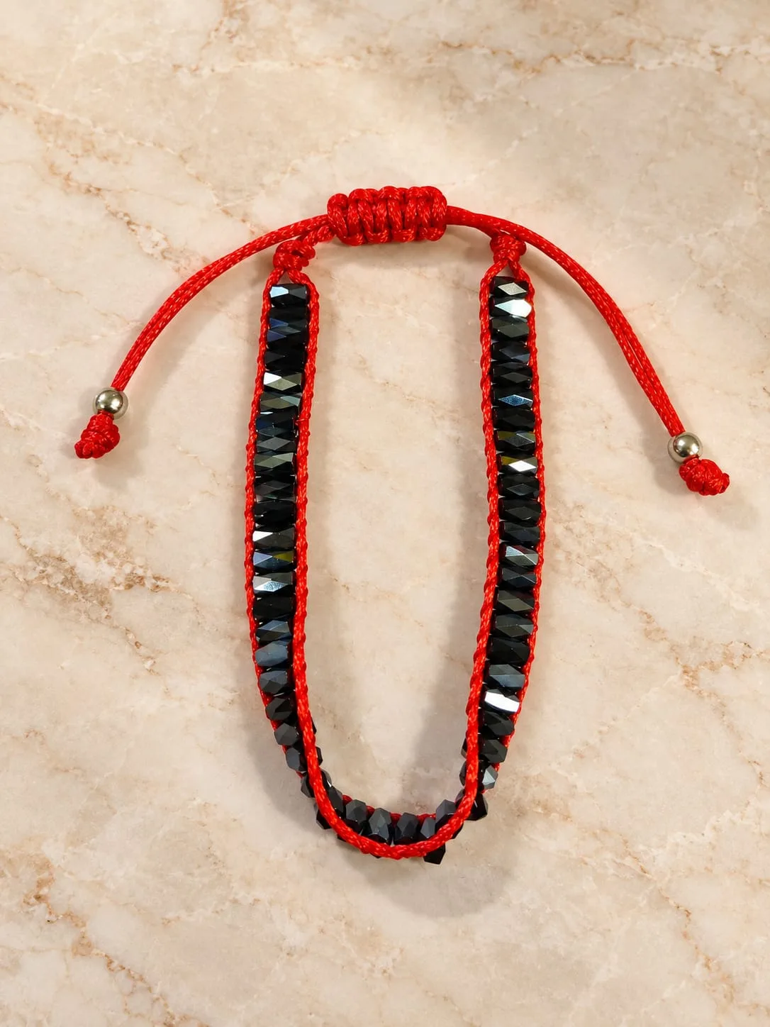 Pulsera de Cristal Negro Metálico con Hilo Rojo