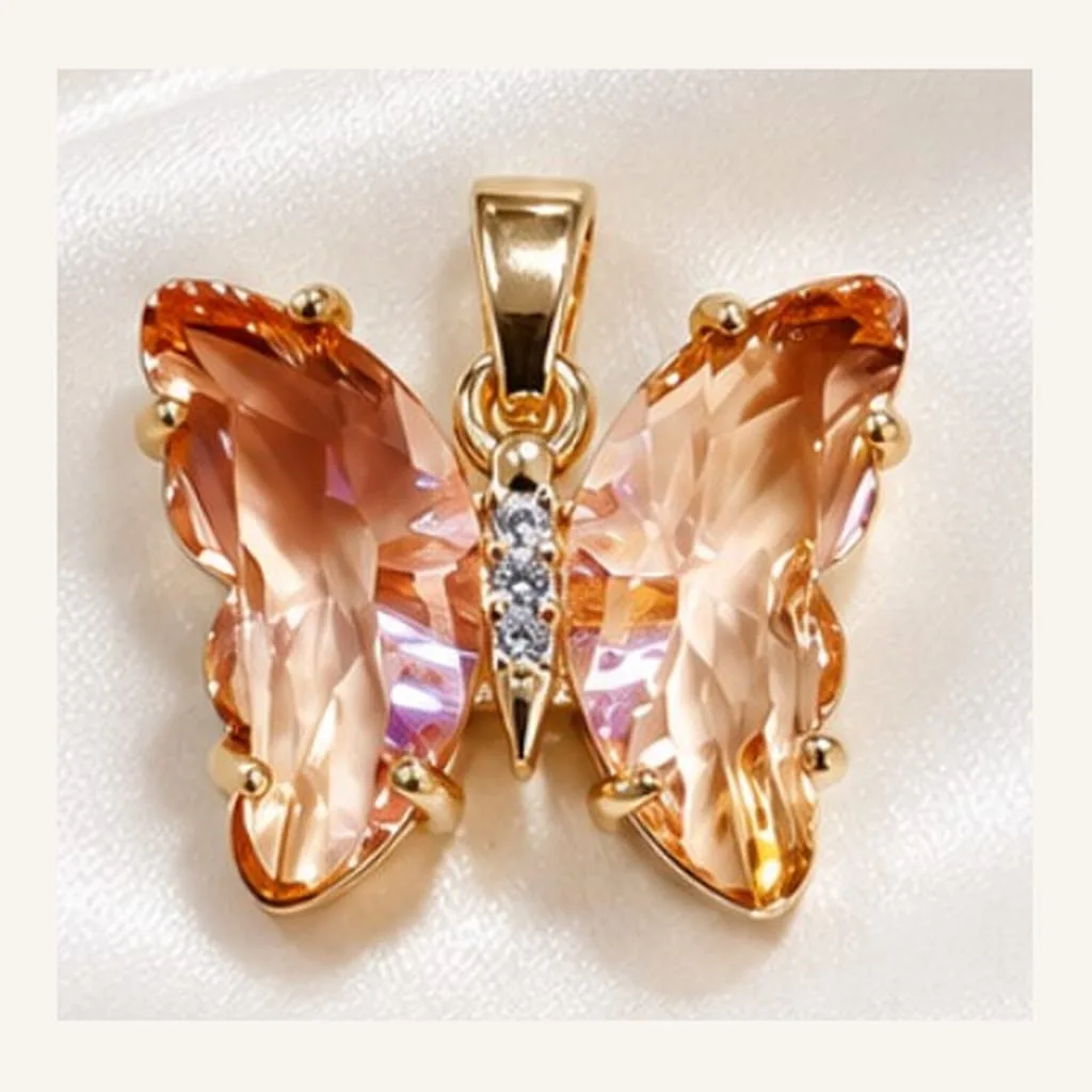 Dije de Acero Mariposa de Cristal Durazno