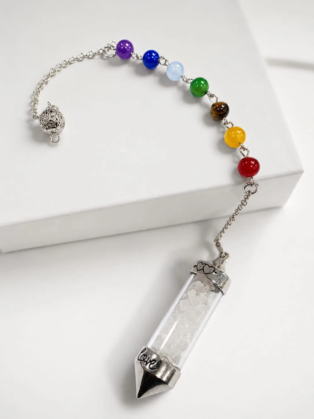 Péndulo 7 Chakras y Cuarzo Molido - Cuarzo Cristal