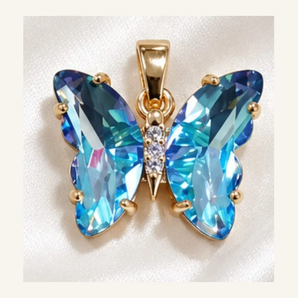 Dije de Acero Mariposa de Cristal Celeste