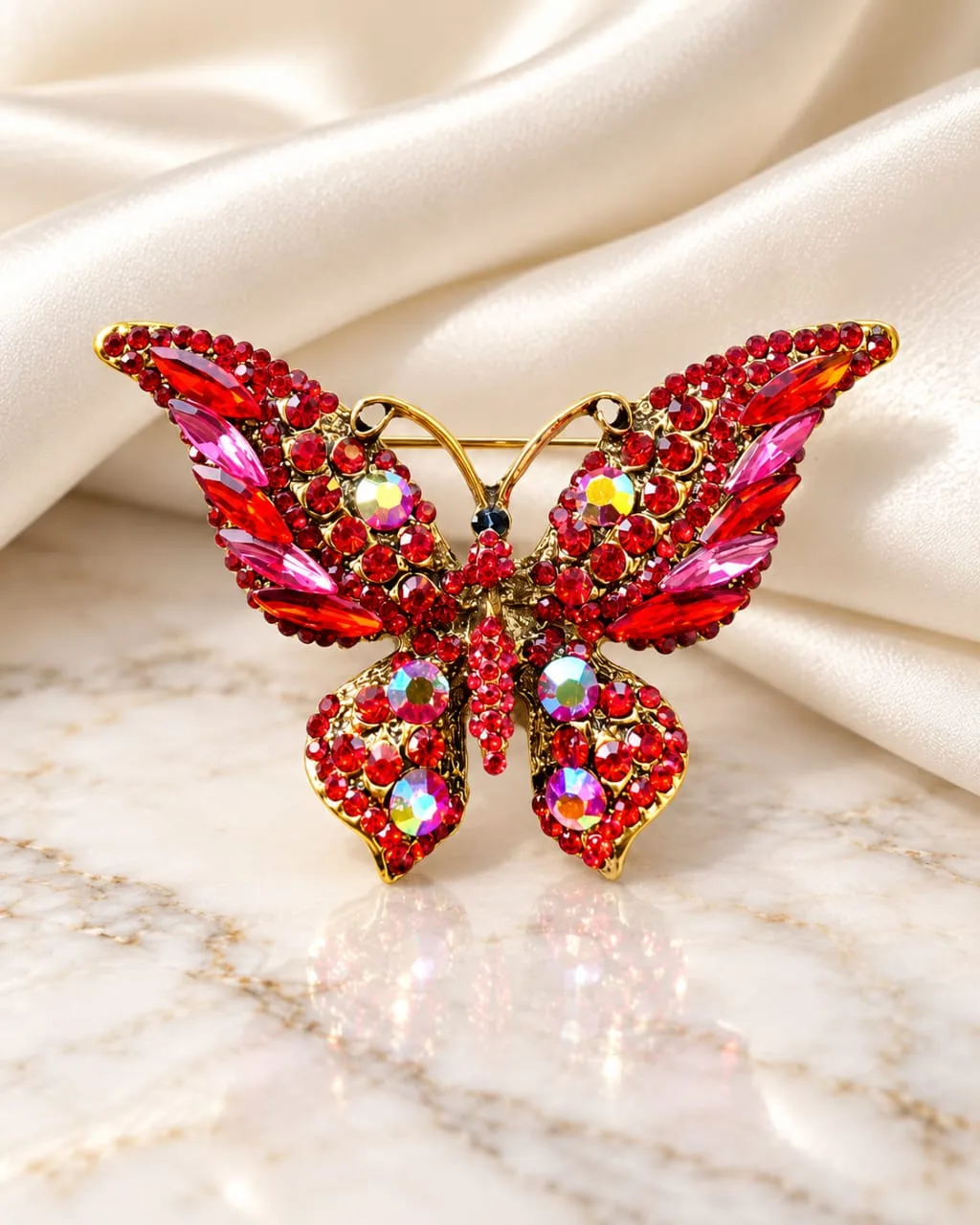 Broche de Mariposa con Pedrería Roja y Rosa