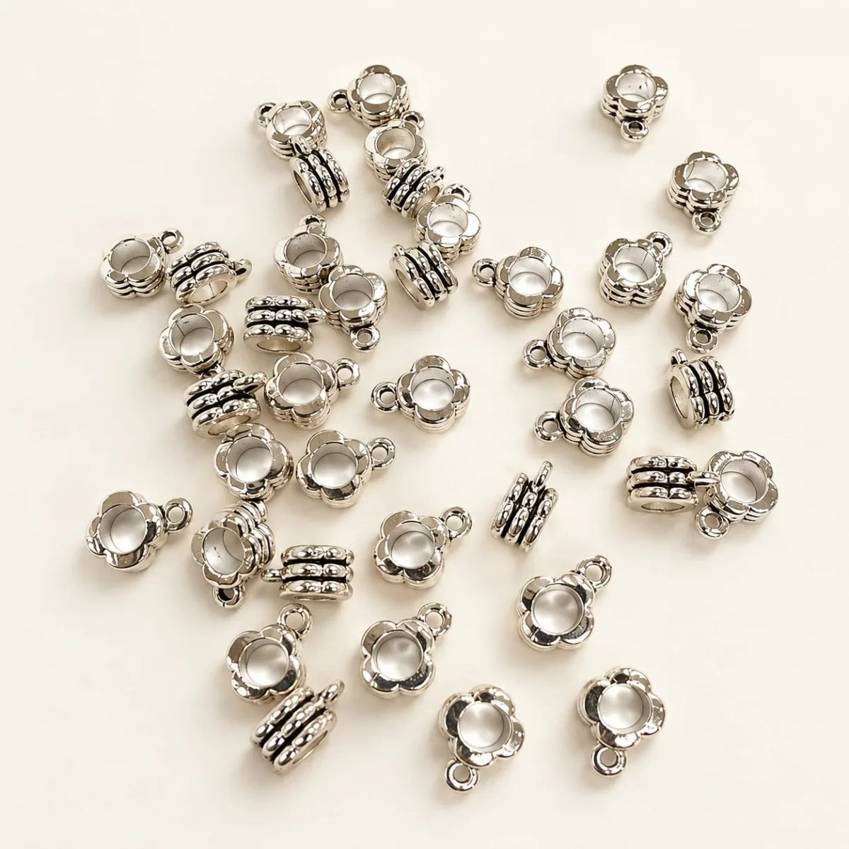 Separador Metálico con Argolla Flor de Anillos 6mm