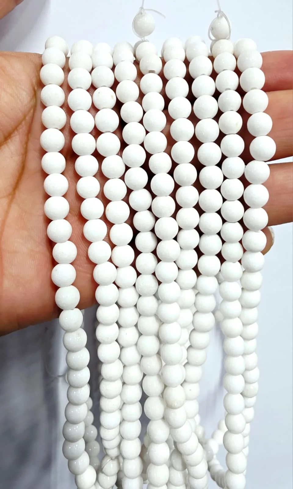 Tira de piedras de Onix Blanco Brillante N°6