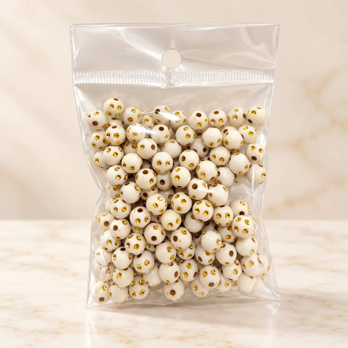 Cuentas Acrílicas Blanco con Puntos Dorados 8 mm