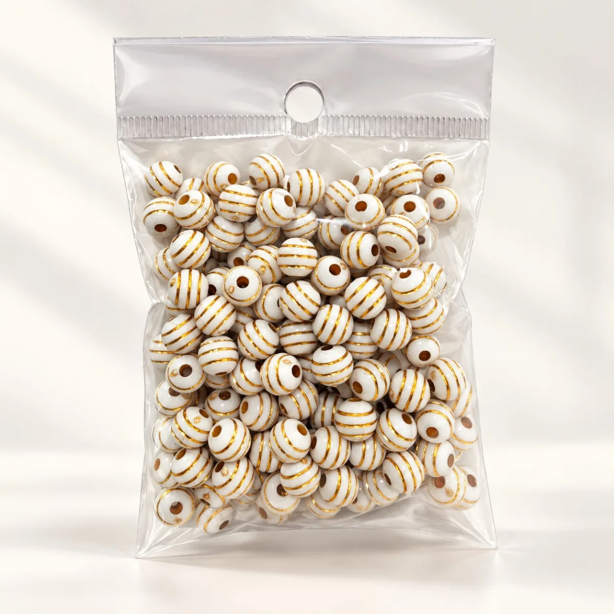 Cuenta Acrílica Rayada 8mm Crema con Rayas Café