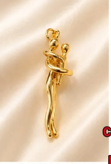 Colgante en Rodio - Bailarina/figura femenina estilizada dorada