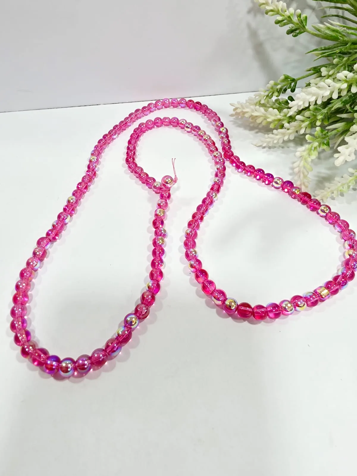 Cuentas de Vidrio Tornasolado Azul Marino con Destellos Rosa y Dorado 6mm