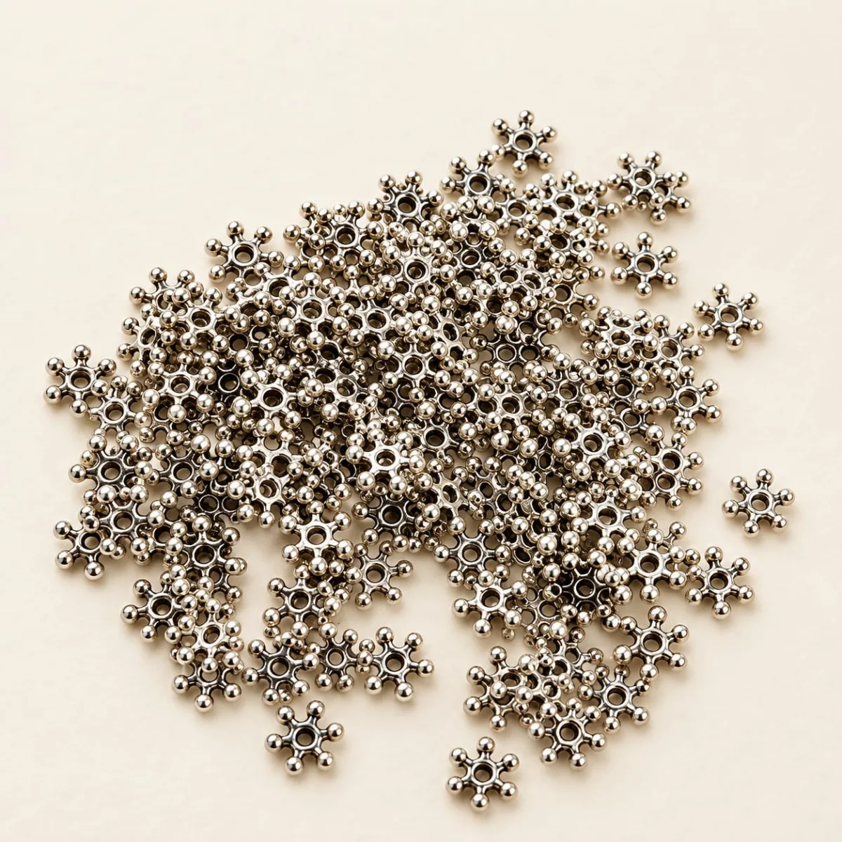 Separador Metálico Estrella 5 Puntas Plateada 6mm
